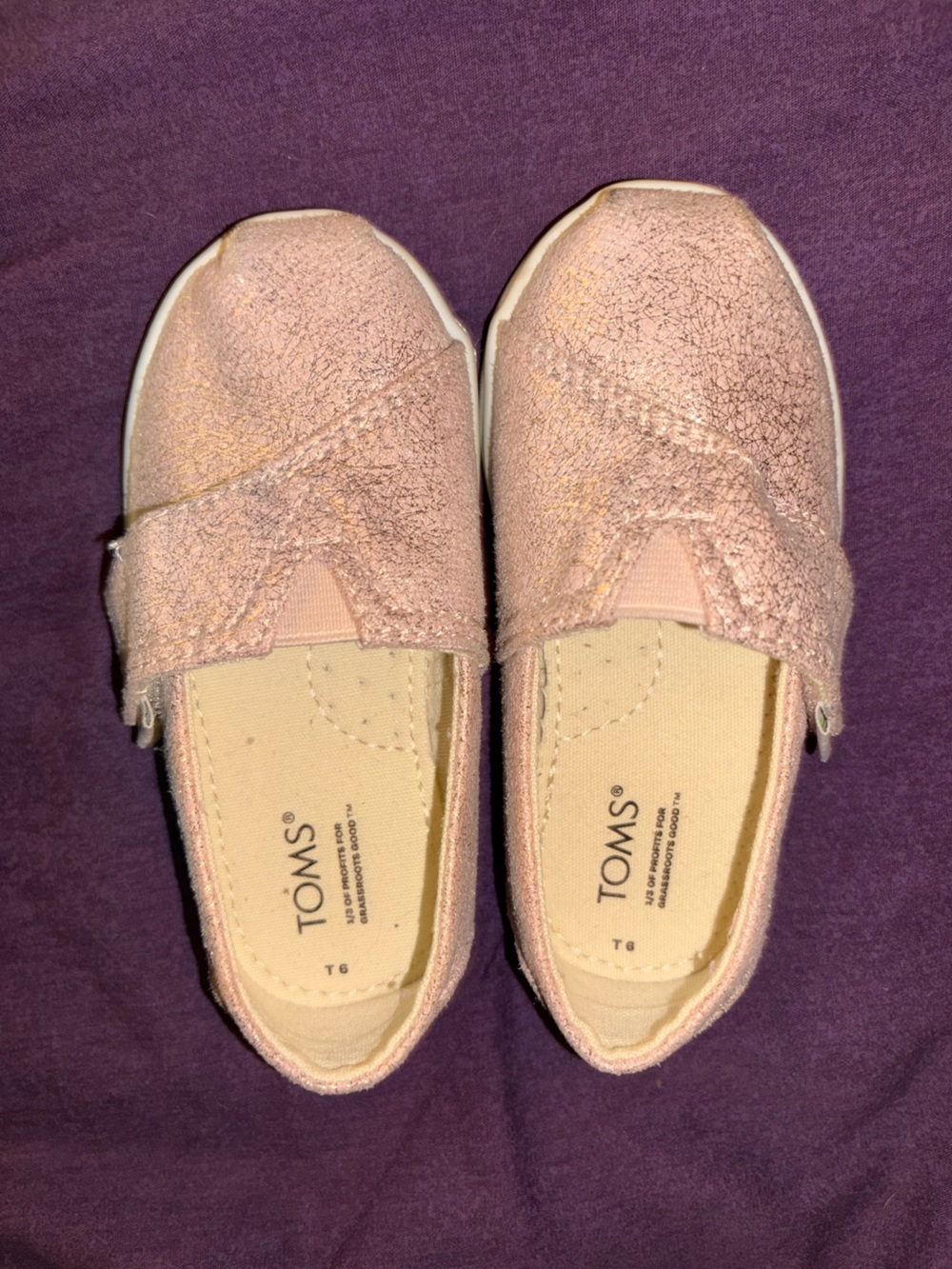 TOMS Girls Glitter Slip-Ons in Light Pink